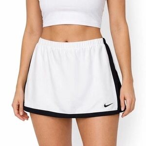 Nike Dri-FIT women's tennis or golf skort with white fabric and black trim